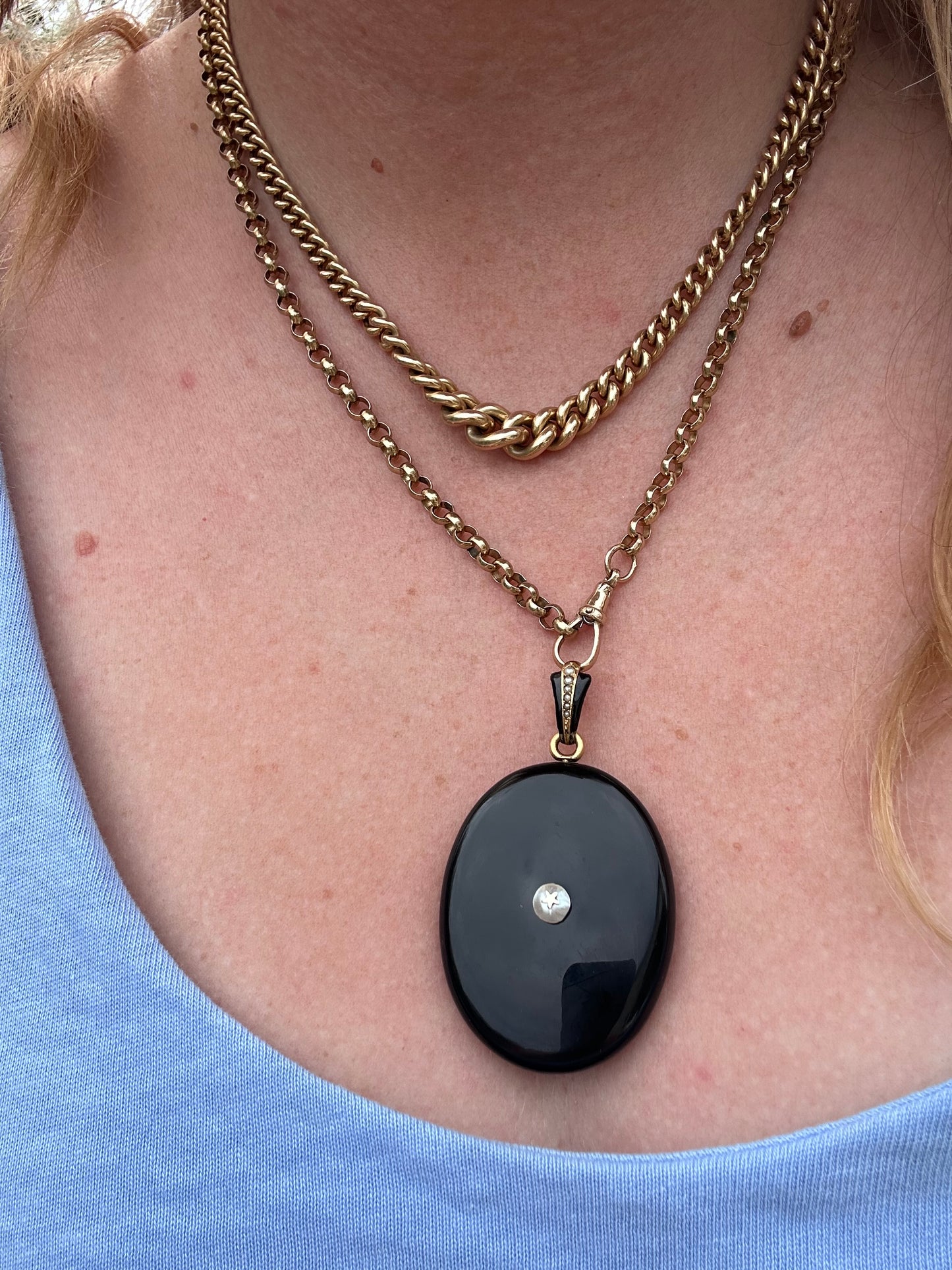 18ct Gold Onyx Locket with seed pearls, enamel and star detail. Frame 15ct.