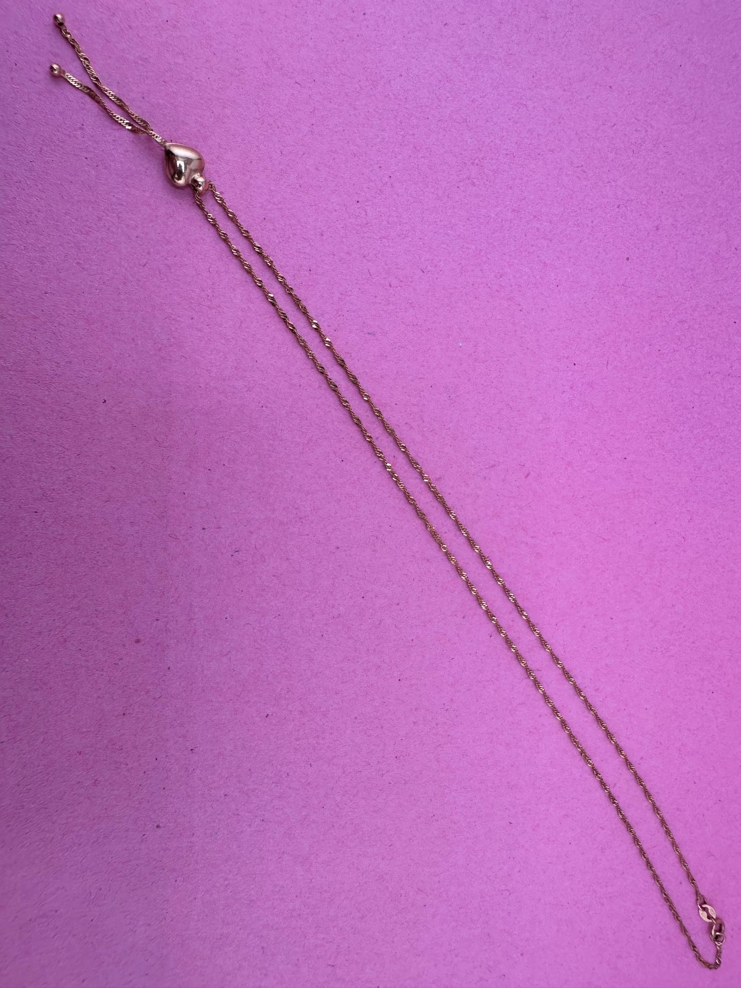 Vintage 9ct Gold Loose Rope chain with heart tassel slider.
