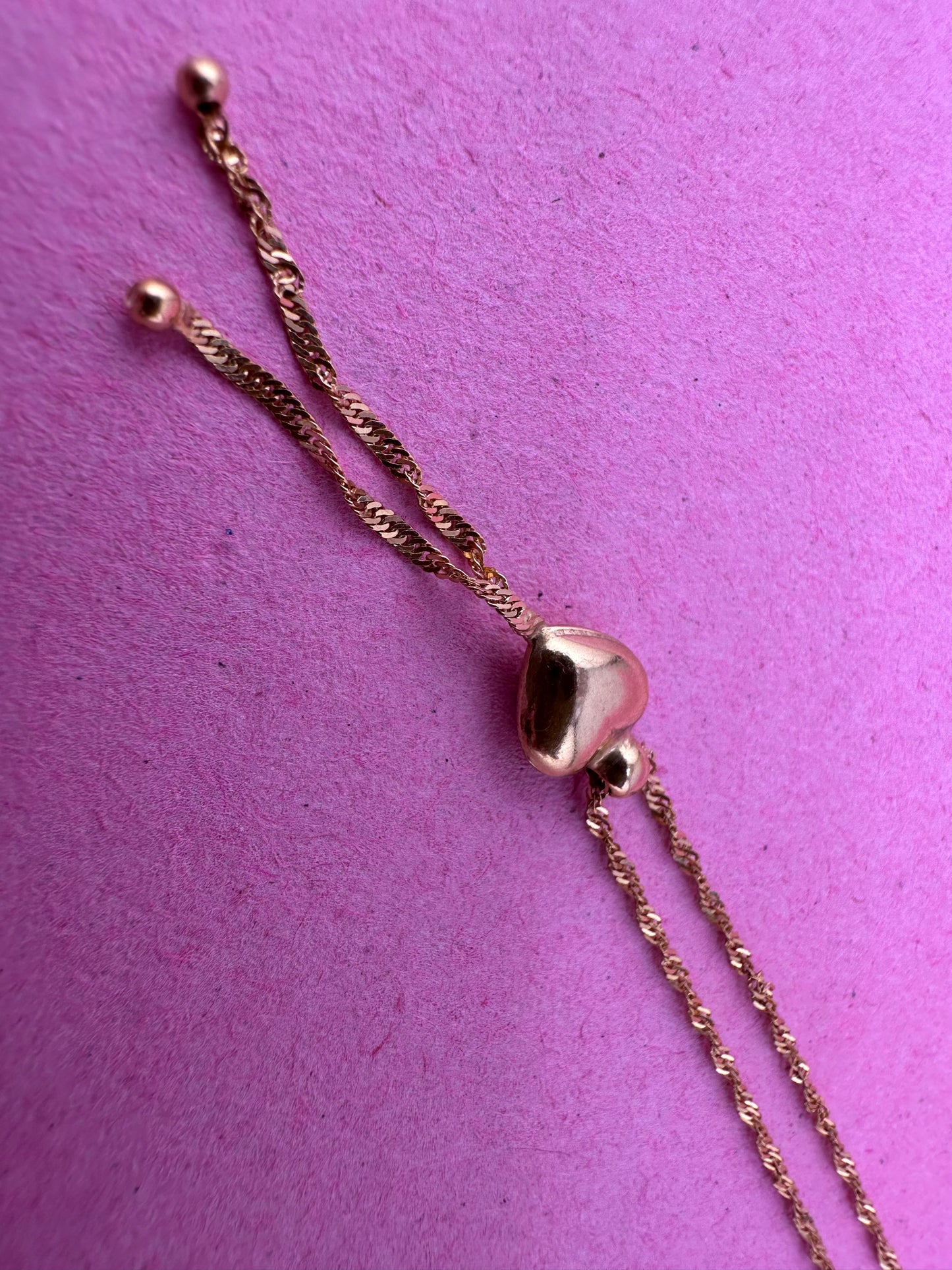 Vintage 9ct Gold Loose Rope chain with heart tassel slider.