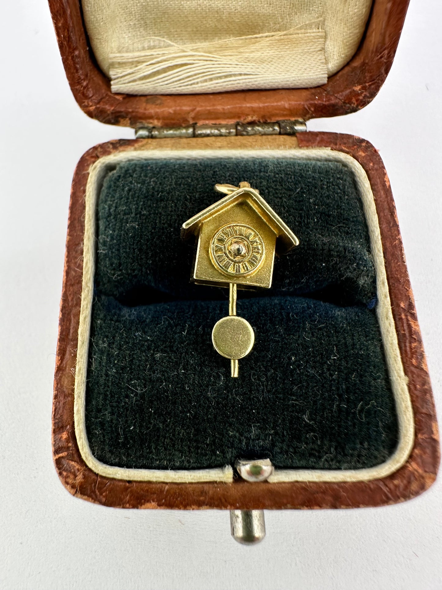 9ct Gold Articulated Cuckoo Clock with moving pendulum
