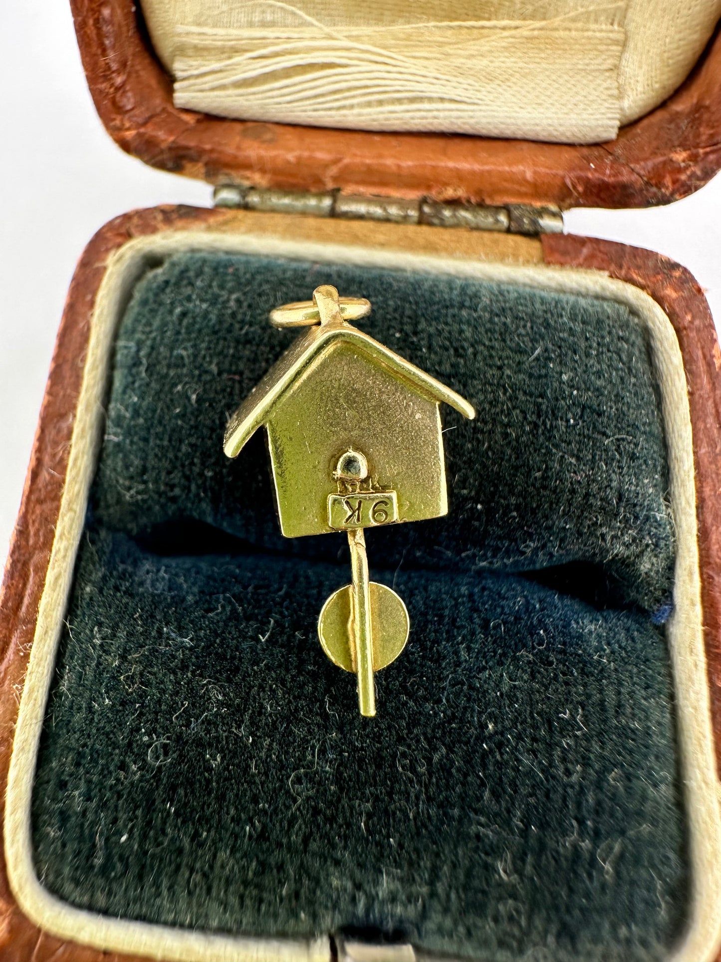 9ct Gold Articulated Cuckoo Clock with moving pendulum