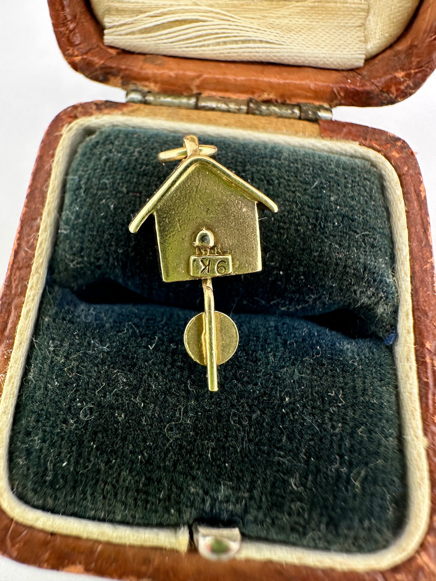 9ct Gold Articulated Cuckoo Clock with moving pendulum