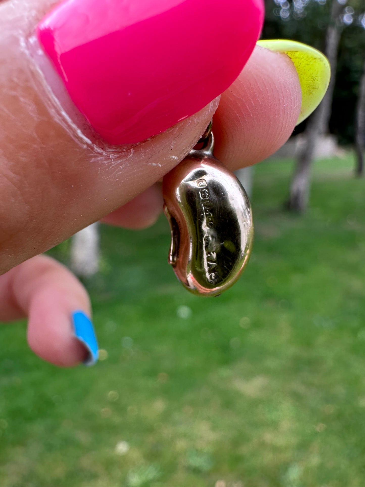 Antique 9ct gold Lucky Bean Charm with star set Iolite