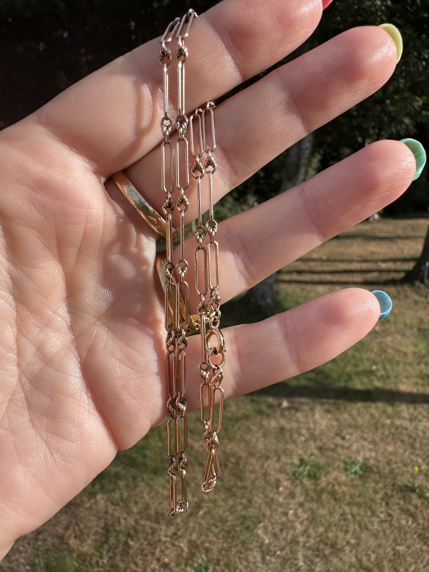 Antique 9ct Rose Gold mini trombone and lovers knot chain