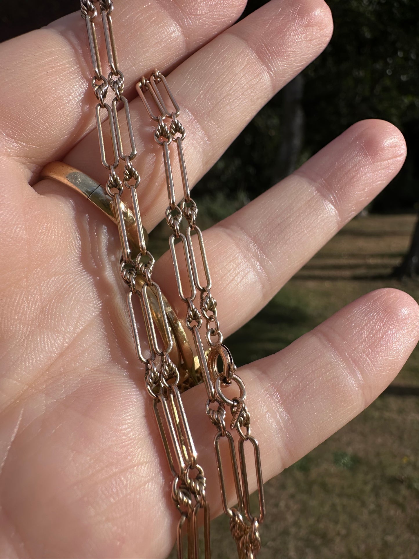 Antique 9ct Rose Gold mini trombone and lovers knot chain