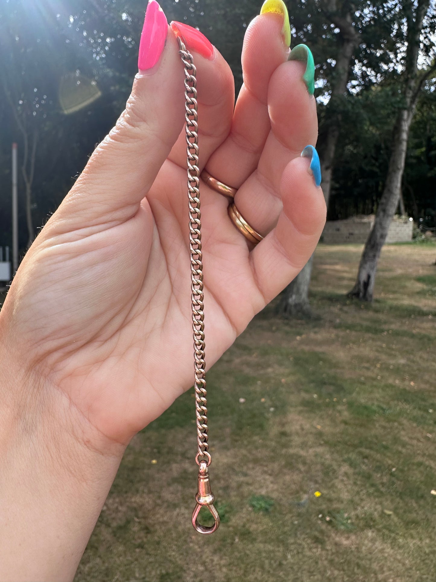 Antique 9ct gold curb extender with antique dog clip.