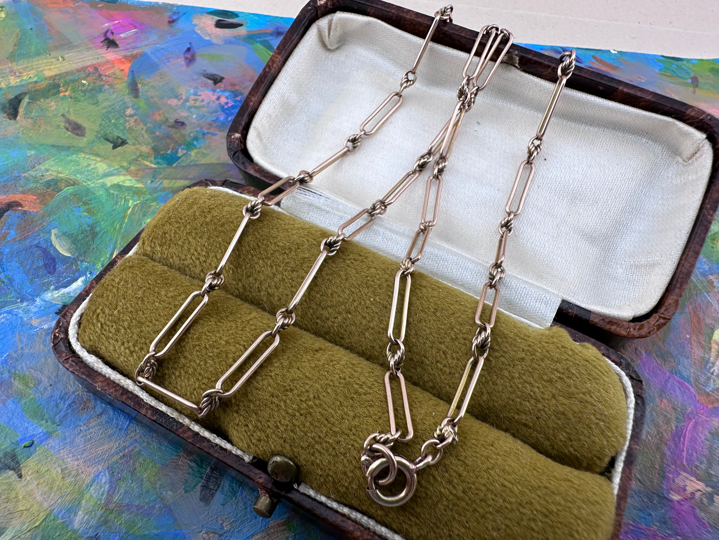 Antique 9ct Rose Gold mini trombone and lovers knot chain