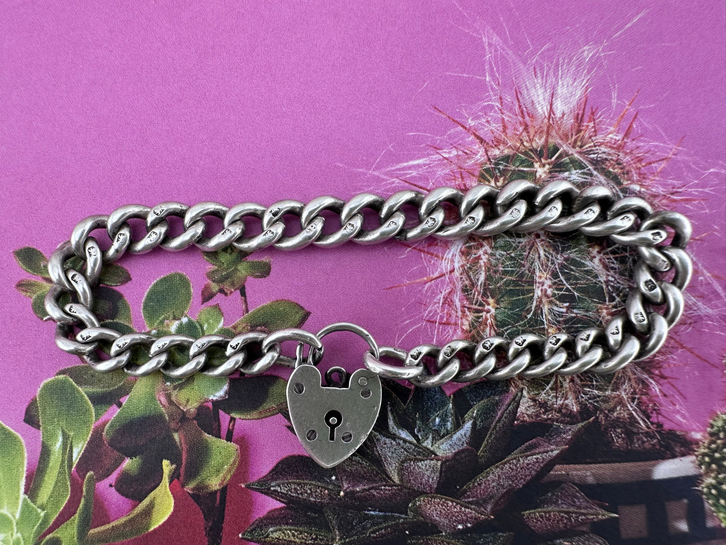 Antique Sterling silver graduated curb bracelet with vintage heart padlock clasp