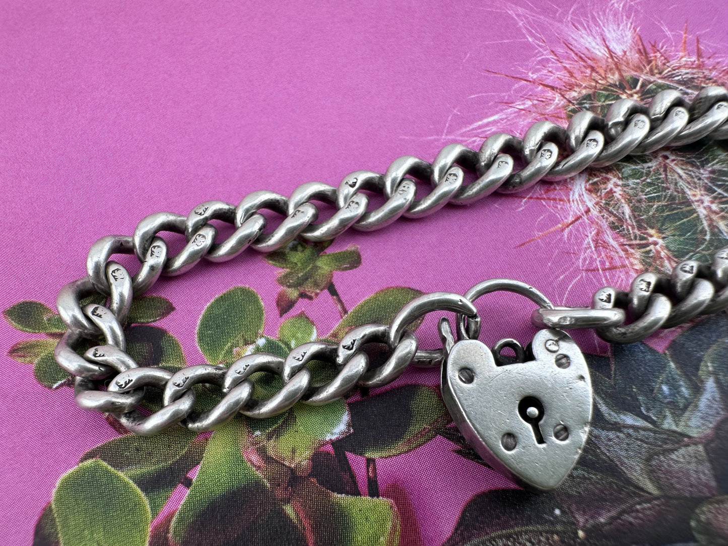 Antique Sterling silver graduated curb bracelet with vintage heart padlock clasp