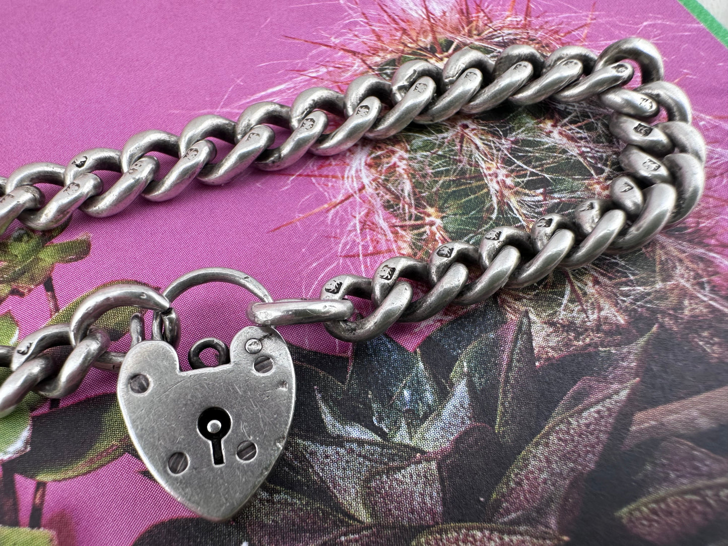 Antique Sterling silver graduated curb bracelet with vintage heart padlock clasp