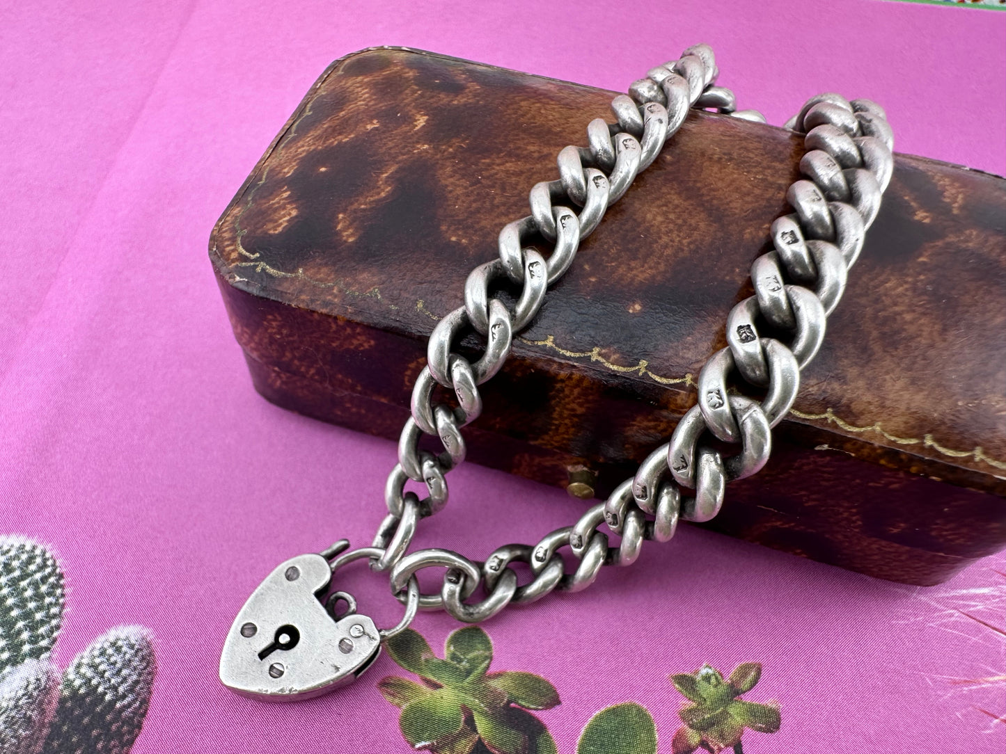 Antique Sterling silver graduated curb bracelet with vintage heart padlock clasp