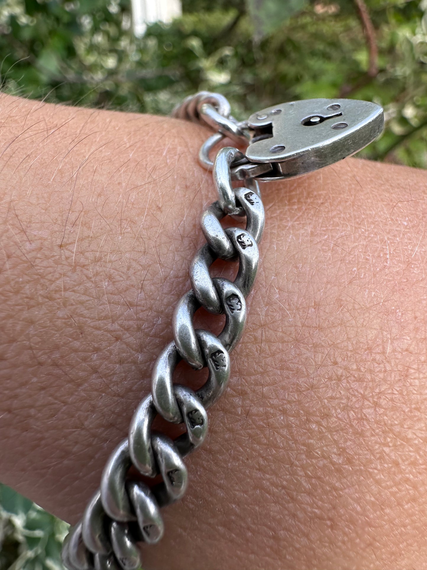 Antique Sterling silver graduated curb bracelet with vintage heart padlock clasp