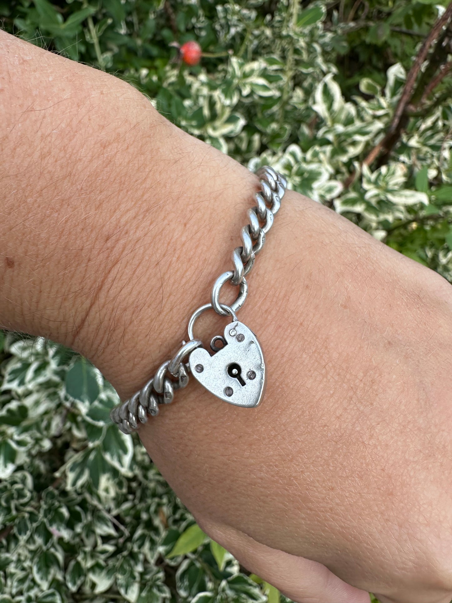 Antique Sterling silver graduated curb bracelet with vintage heart padlock clasp
