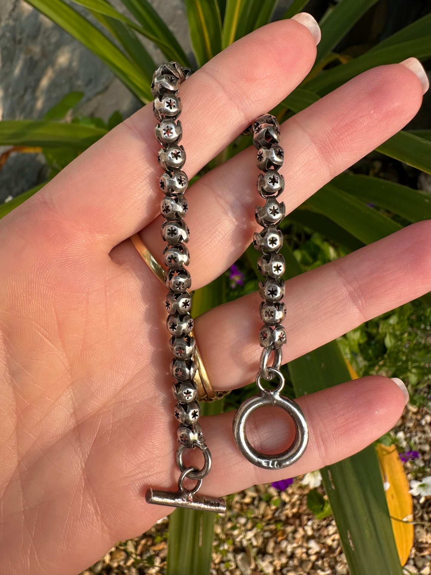 Sterling Silver Star Pierced Ball link bracelet with toggle clasp