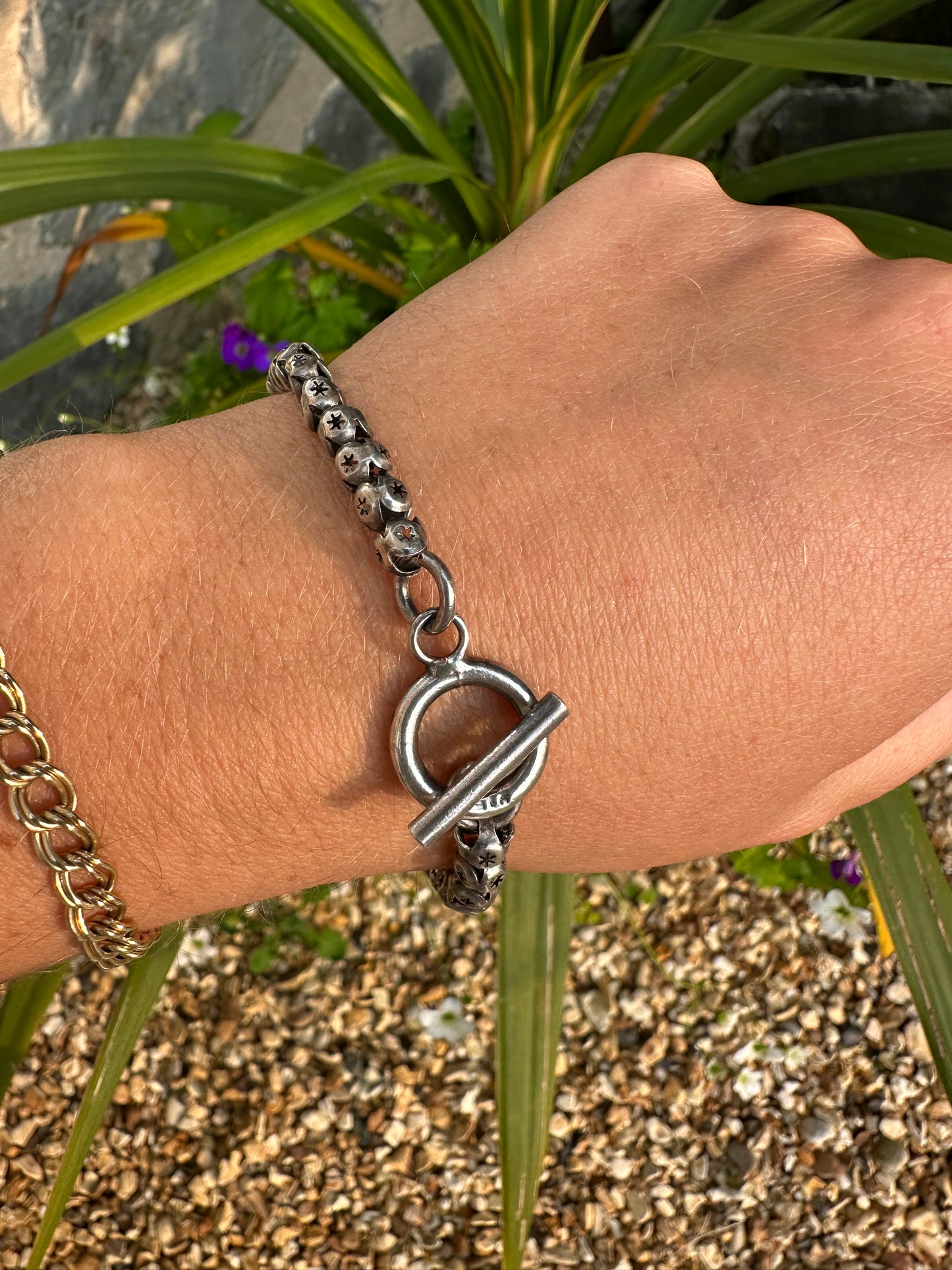 Sterling Silver Star Pierced Ball link bracelet with toggle clasp