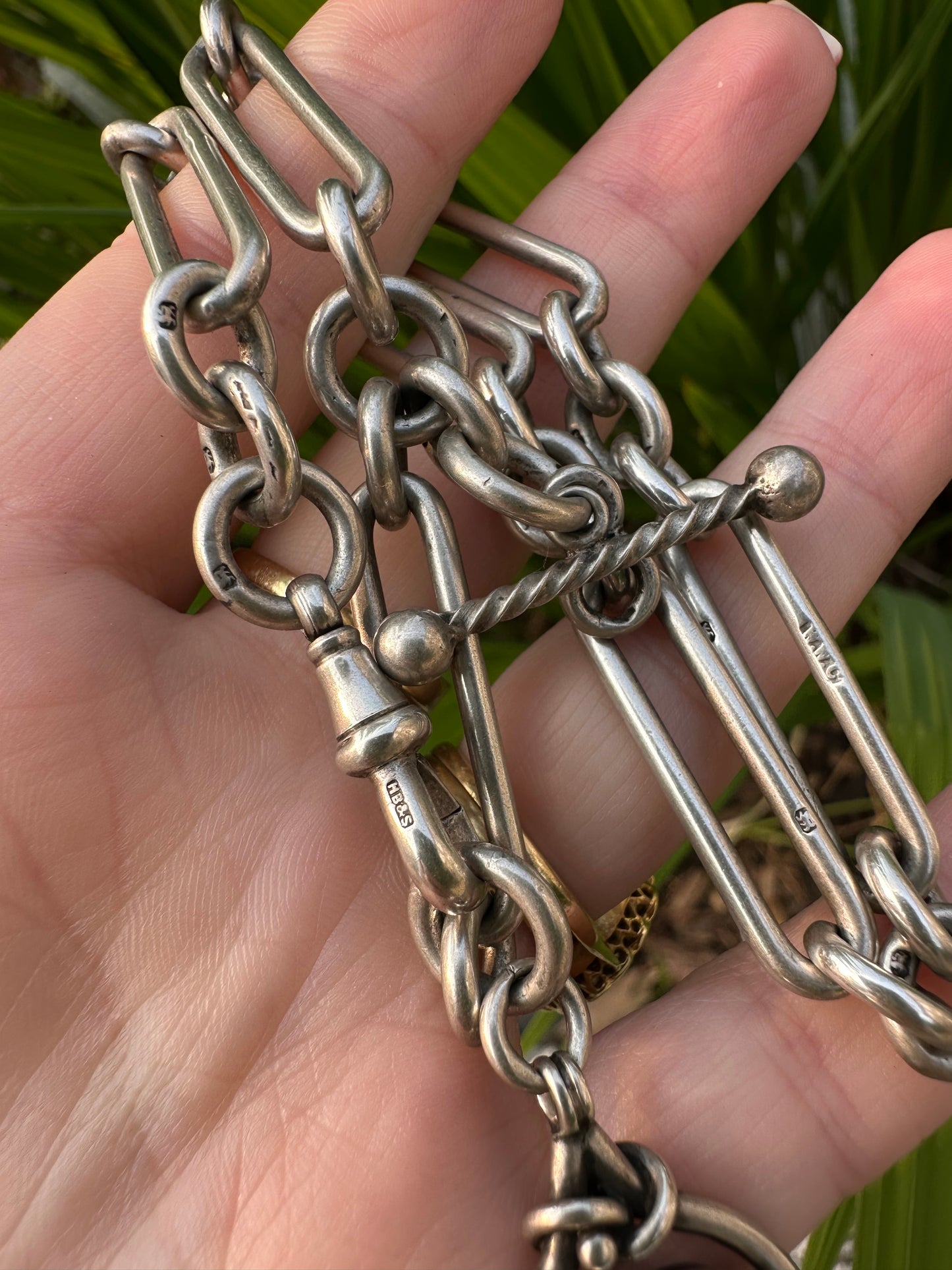Antique Sterling Silver Trombone Albert chain with fob, 1886