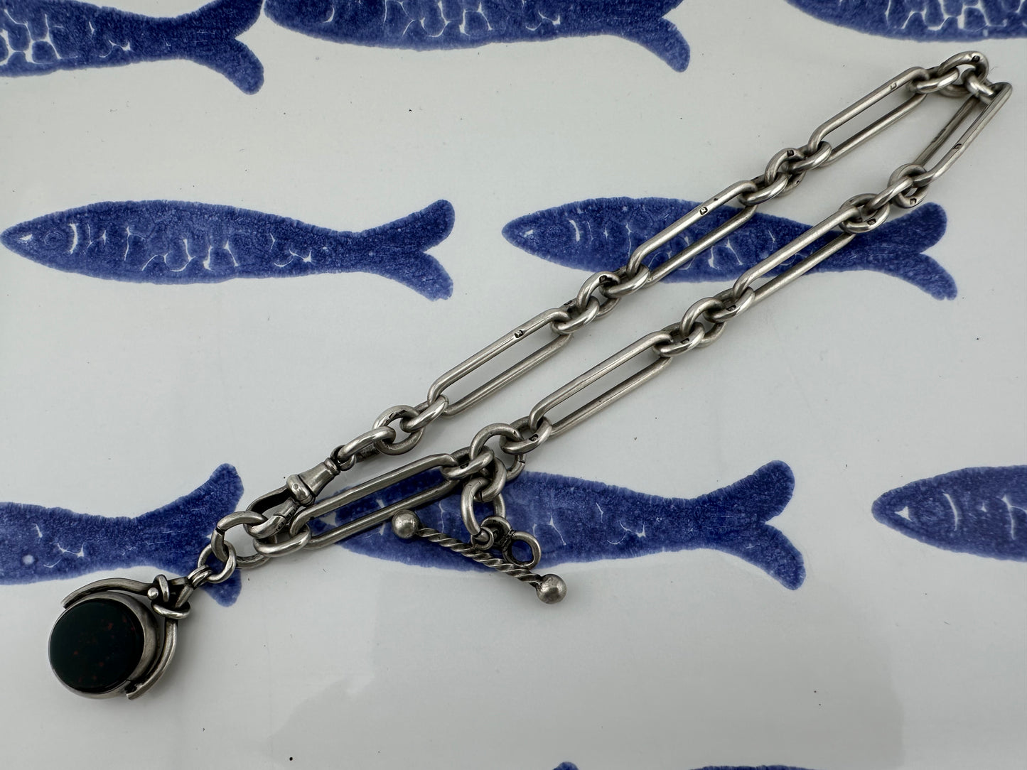 Antique Sterling Silver Trombone Albert chain with fob, 1886