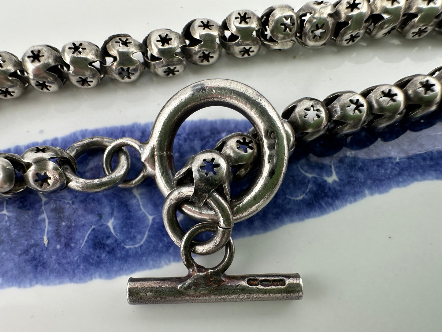 Sterling Silver Star Pierced Ball link bracelet with toggle clasp