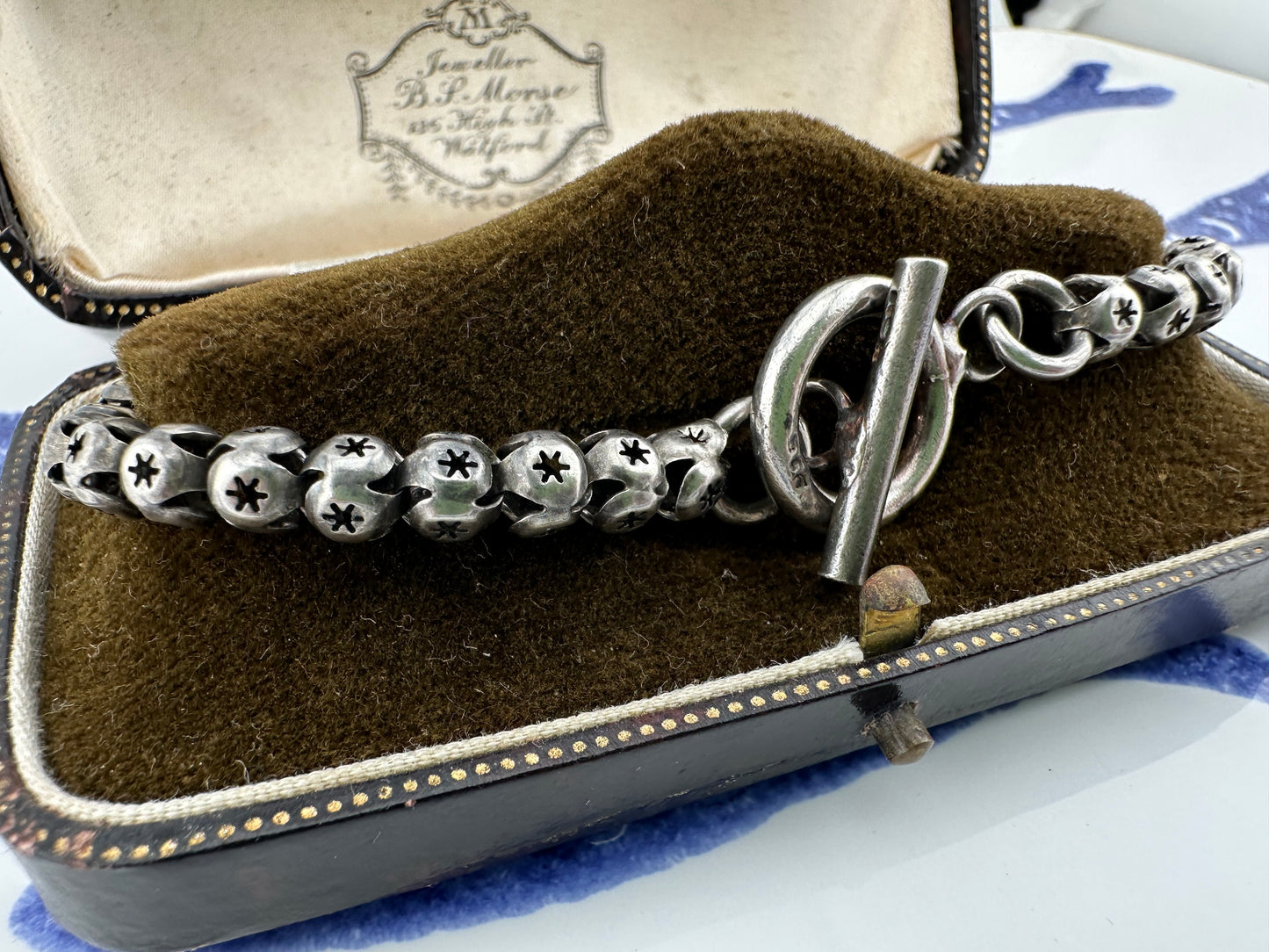 Sterling Silver Star Pierced Ball link bracelet with toggle clasp