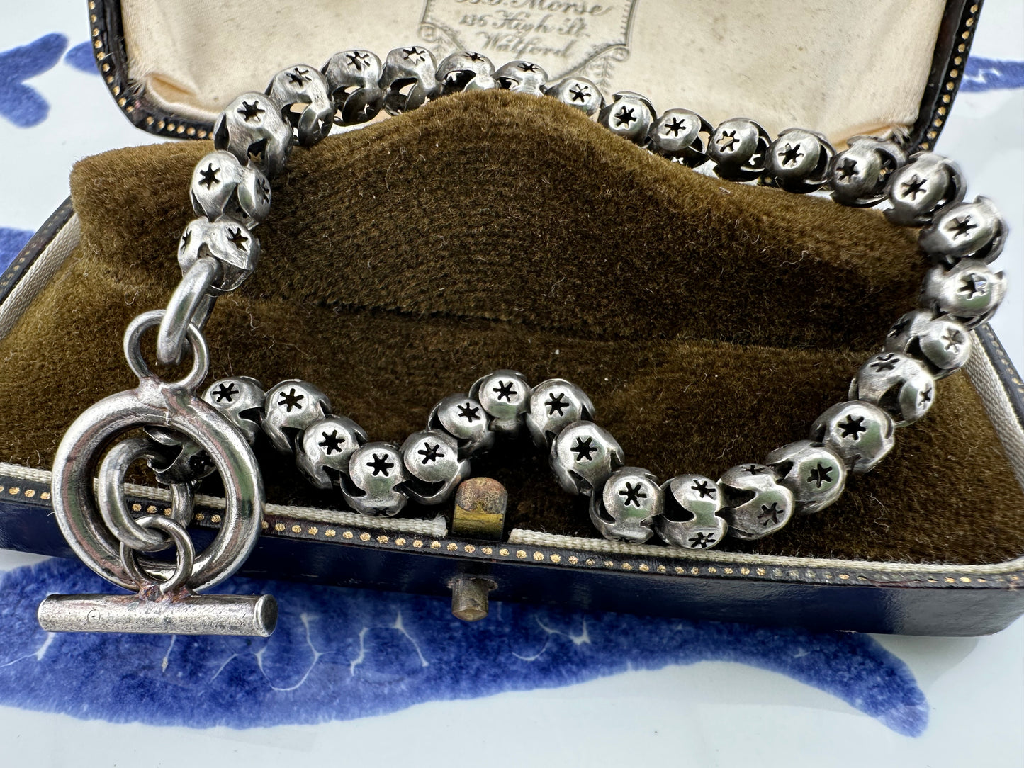 Sterling Silver Star Pierced Ball link bracelet with toggle clasp