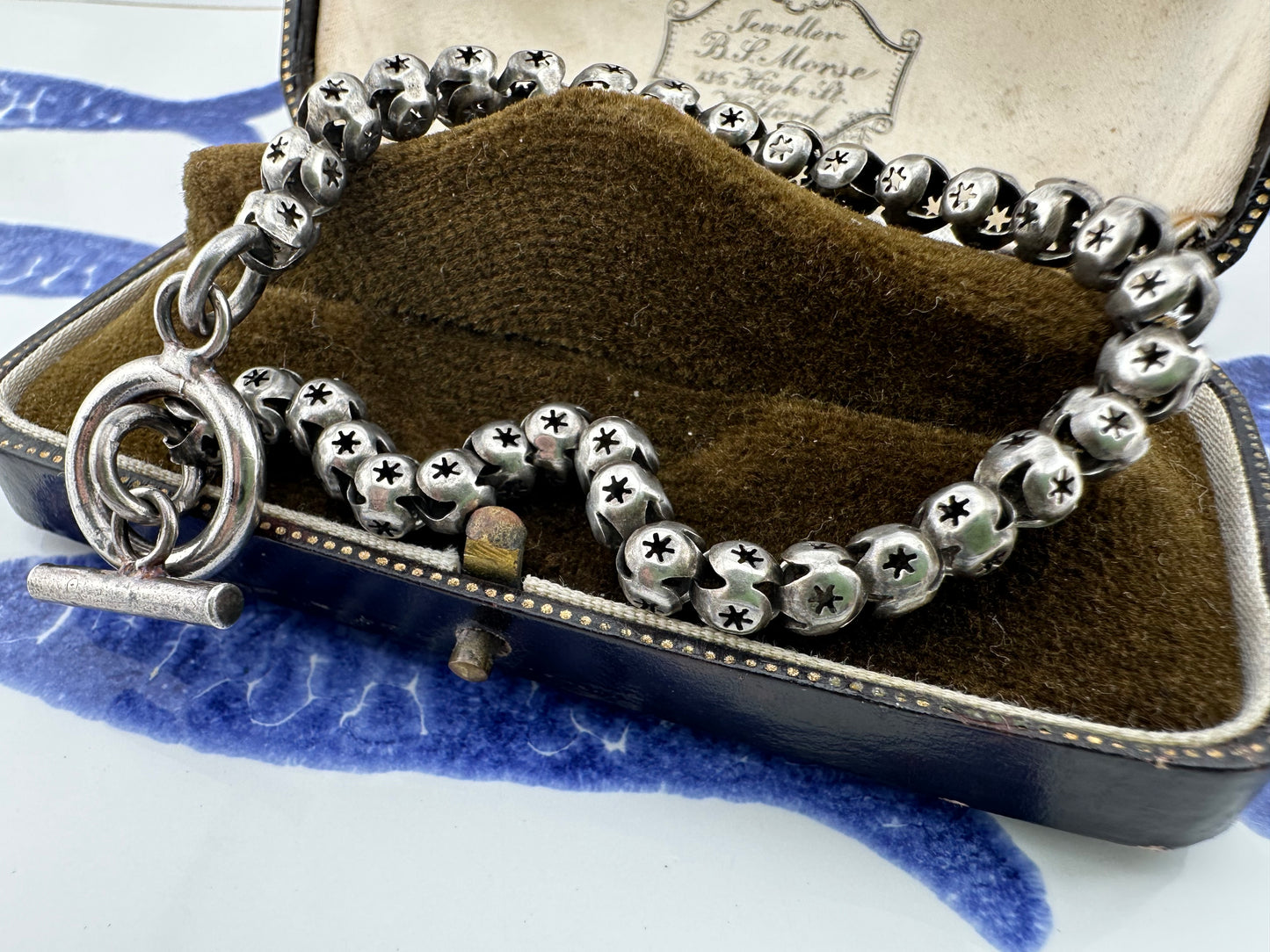 Sterling Silver Star Pierced Ball link bracelet with toggle clasp