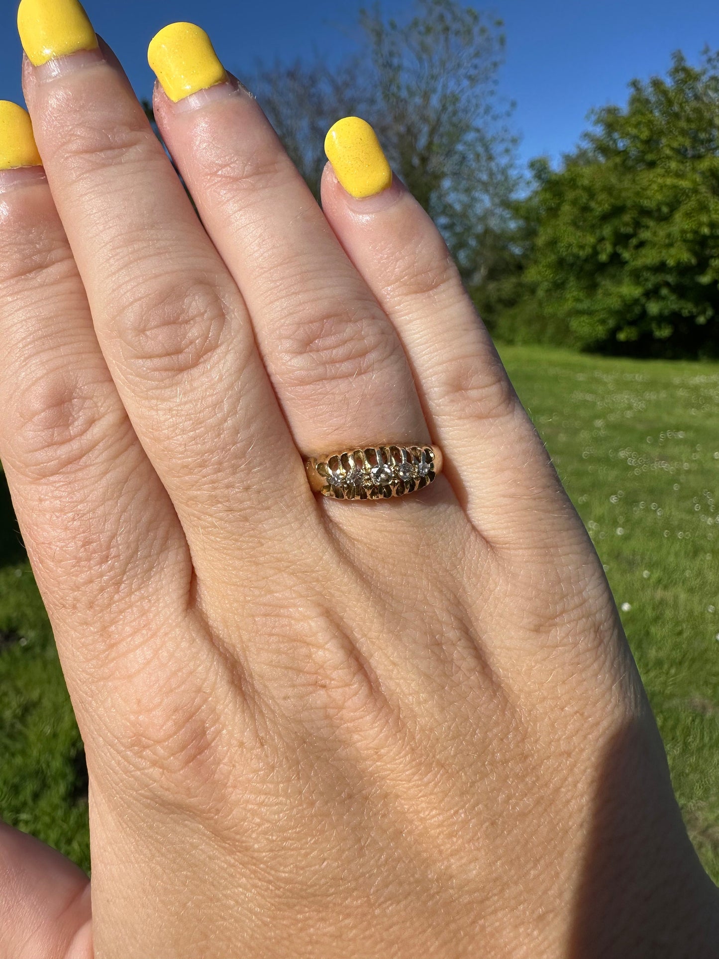Antique 18ct Claw set Graduating Diamond ring, 1915