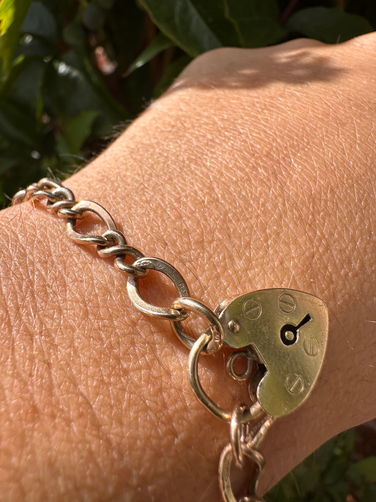 Vintage 9ct Gold Curb and Twist link bracelet with heart padlock