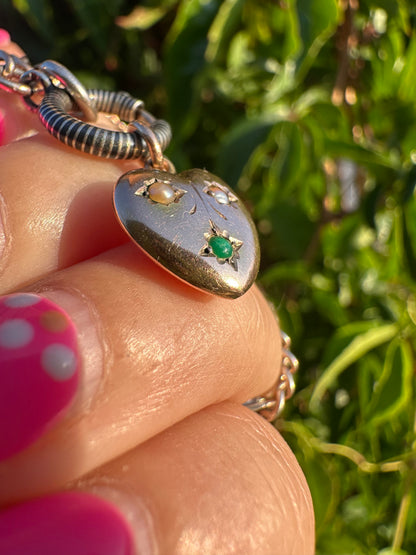 Antique 9ct rose gold heart with flush set pearls and turquoise.