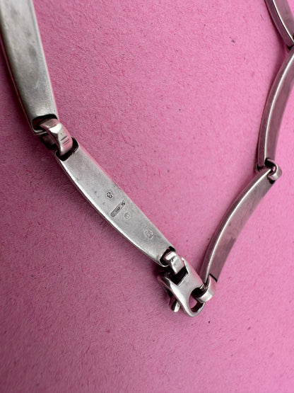 Sterling silver curved bar bracelet