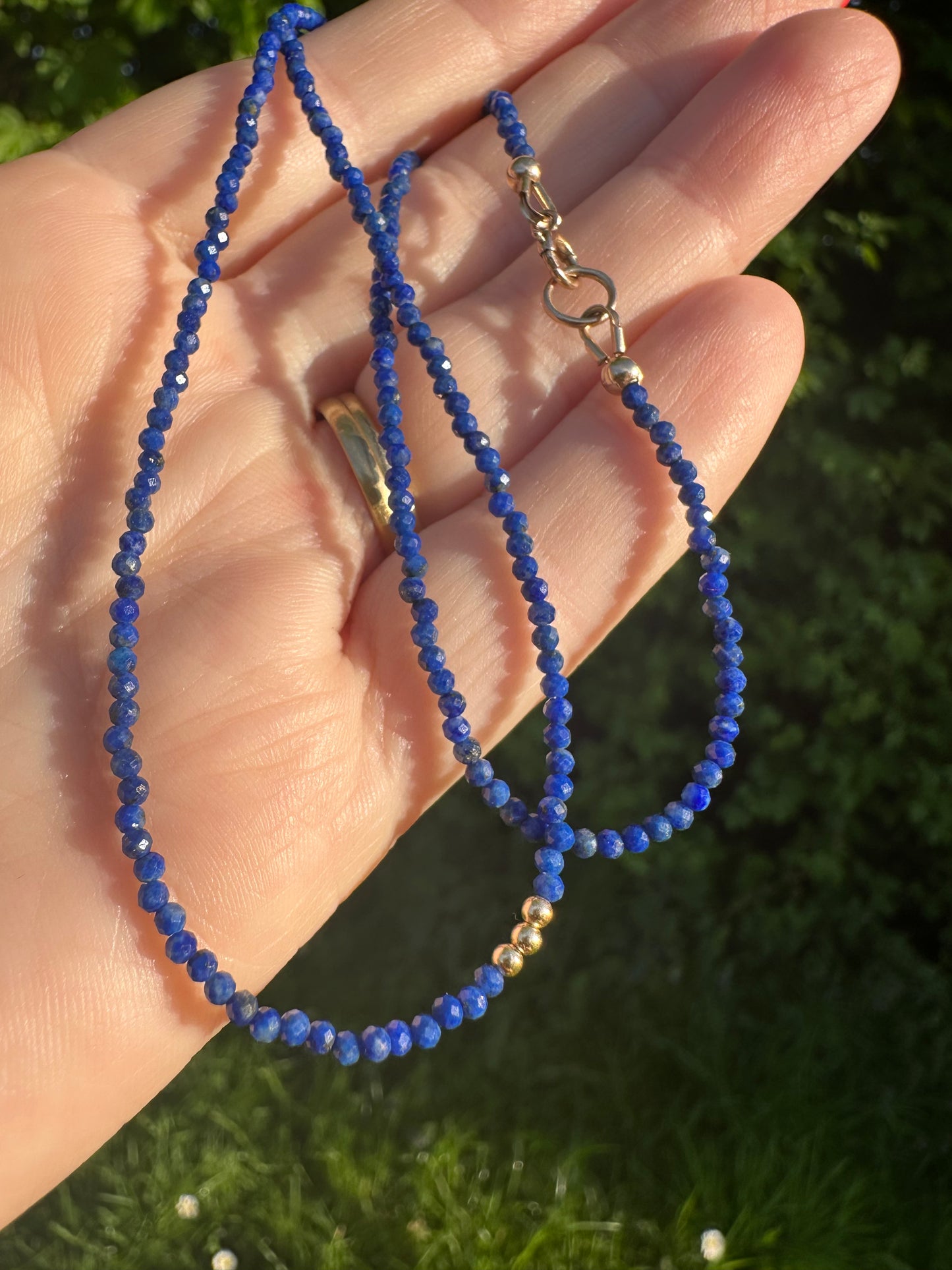 Azure- Lapis Lazuli Mini beaded necklace with asymmetrical design with 9ct antique bolt clasp.