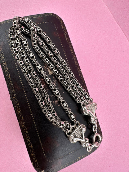 Antique Sterling Silver triple stranded fancy mariner with ornate finials bracelet.
