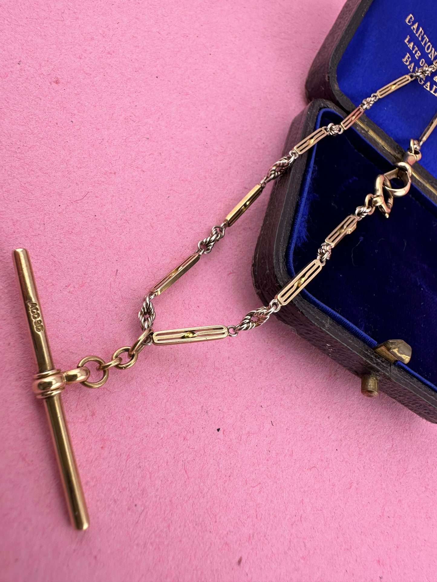 Antique 9ct bi-colour bar and lovers knot Albert chain with floating t-bar, dog clip and bolt clasp