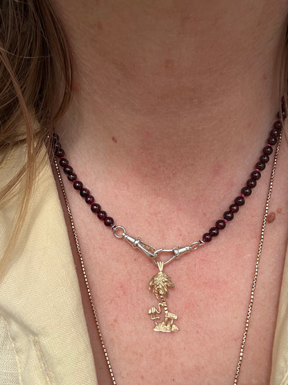 Re-imagined Vintage Garnet Beads with Vintage Sterling silver Dog clips