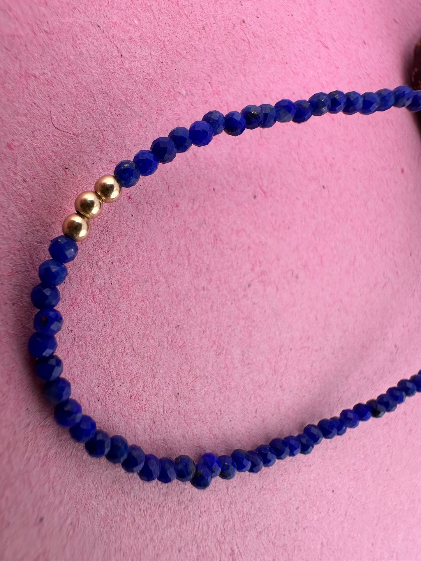 Azure- Lapis Lazuli Mini beaded necklace with asymmetrical design with 9ct antique bolt clasp.