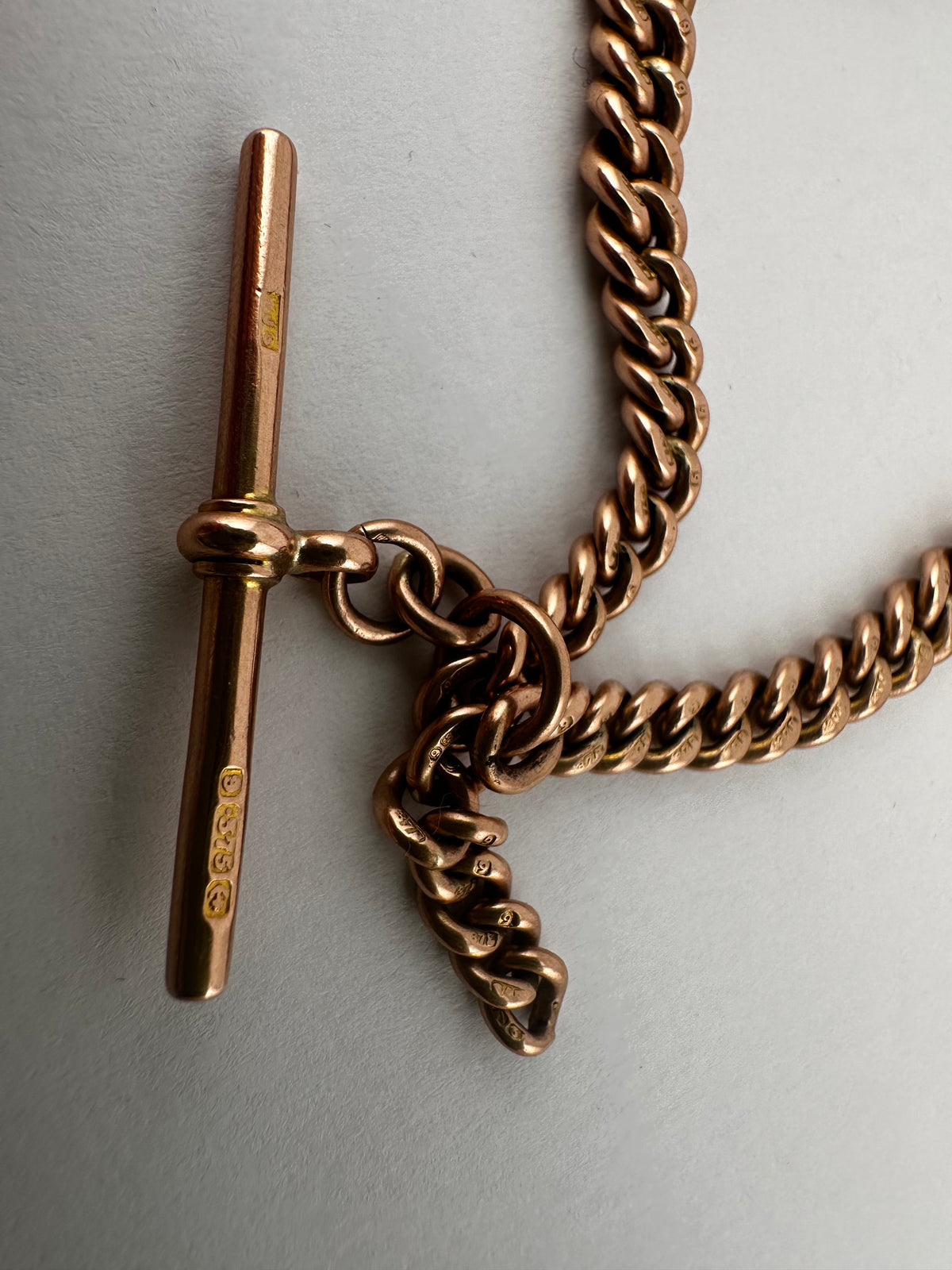 Antique 9ct Rose Gold Graduated Curb Albert chain with double faceted dog clips and fixed T-bar