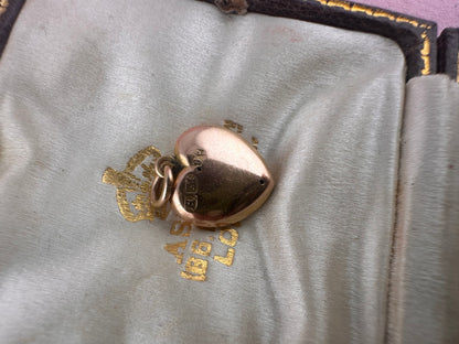 Antique 9ct rose gold heart with flush set pearls and turquoise.