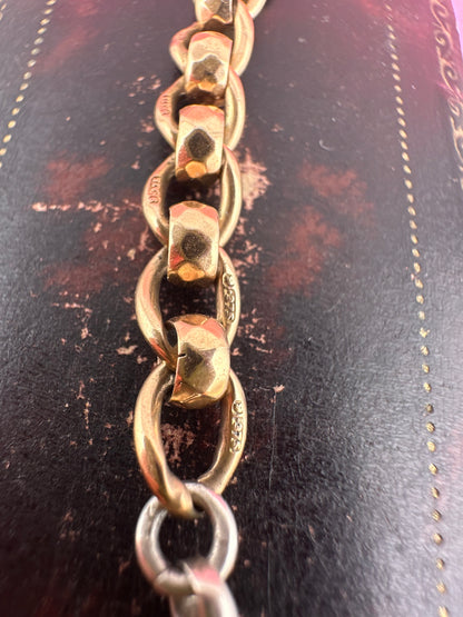Mix metal extender. 9ct Yellow gold roller ball with sterling silver dog clip.