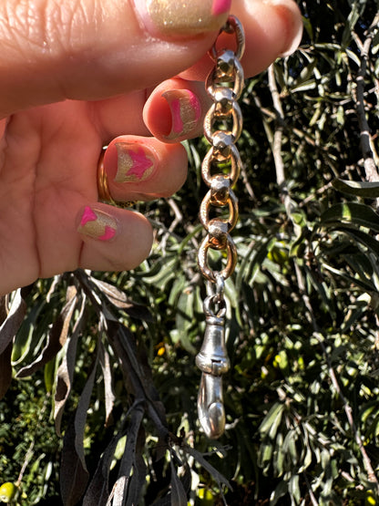 Mix metal extender. 9ct Yellow gold roller ball with sterling silver dog clip.