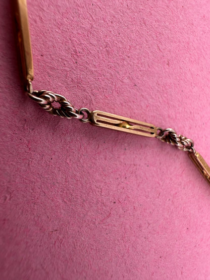 Antique 9ct bi-colour bar and lovers knot Albert chain with floating t-bar, dog clip and bolt clasp