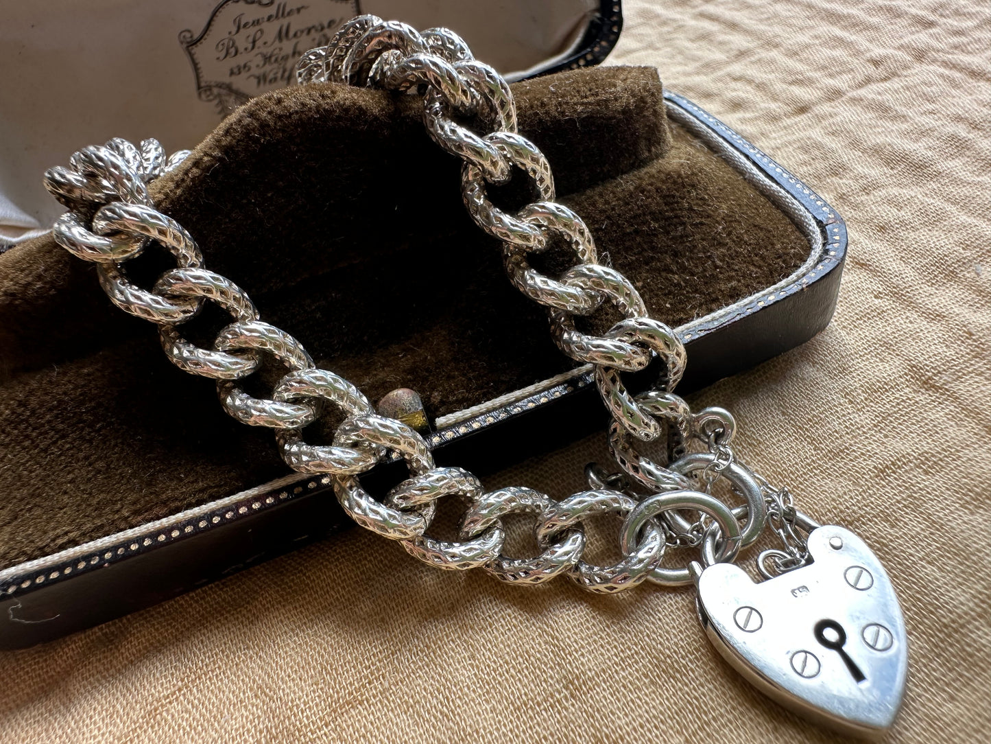 Sterling silver textured chunky curb bracelet with heart padlock