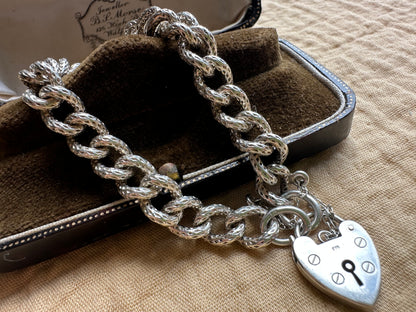 Sterling silver textured chunky curb bracelet with heart padlock