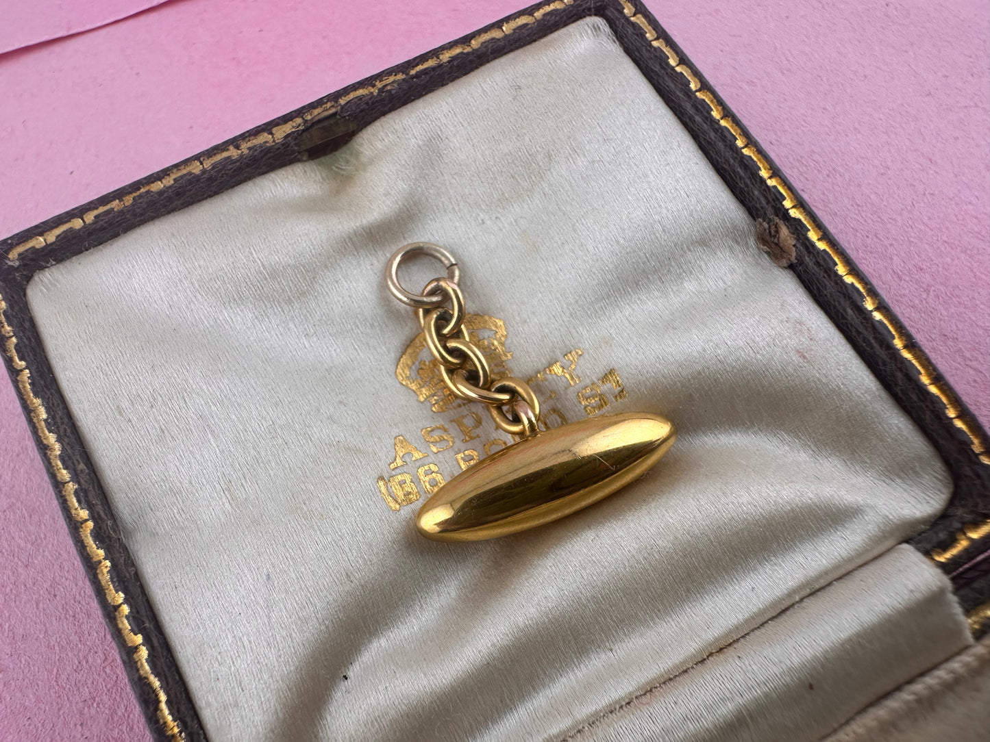Antique 10ct gold Torpedo pendant