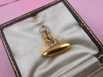 Antique 10ct gold Torpedo pendant