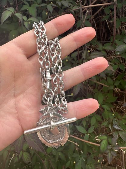 Sterling Silver Lovers Knot Albert chain, with T-bar, dogclip and shield fob.