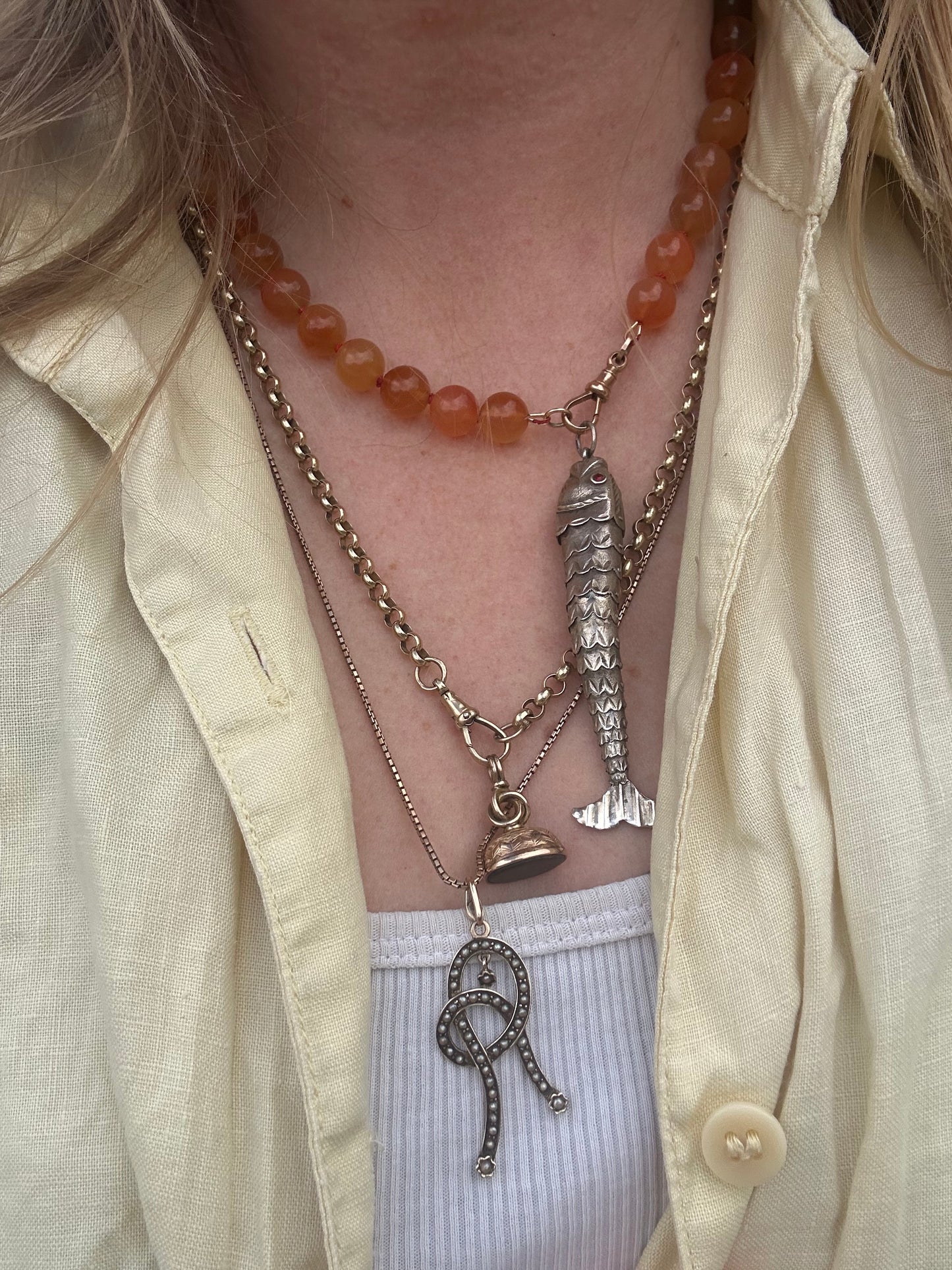 Re-imagined Orange Agate beads with Antique Dog clip