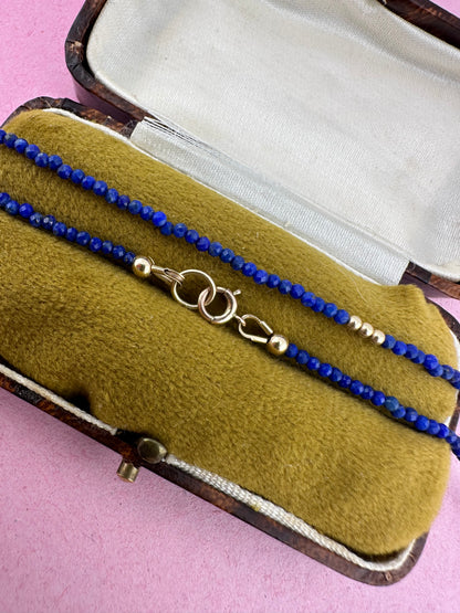 Azure- Lapis Lazuli Mini beaded necklace with asymmetrical design with 9ct antique bolt clasp.