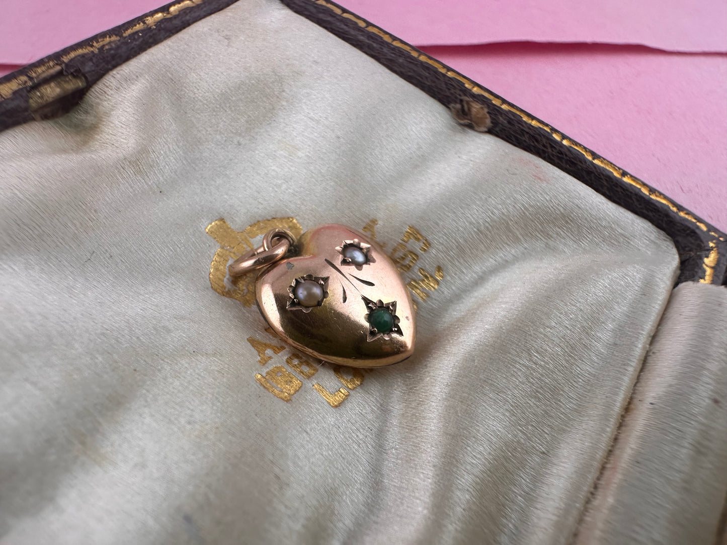 Antique 9ct rose gold heart with flush set pearls and turquoise.