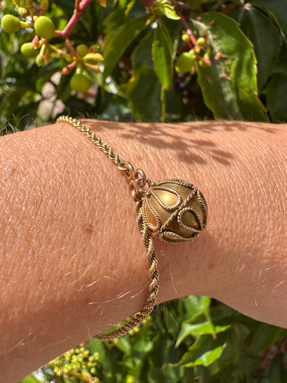 Victorian 15ct Rope bracelet with Etruscan revival orb.
