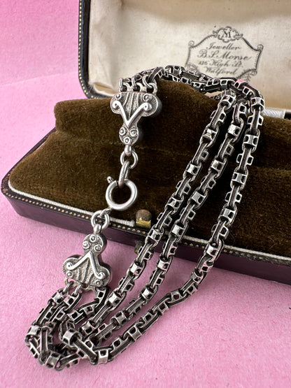 Antique Sterling Silver triple stranded fancy mariner with ornate finials bracelet.