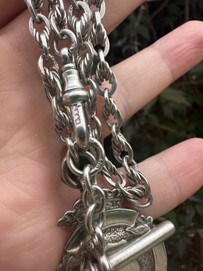 Sterling Silver Lovers Knot Albert chain, with T-bar, dogclip and shield fob.